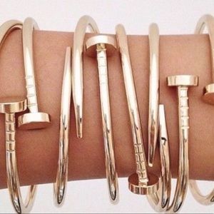 Trendy gold nail bracelet.